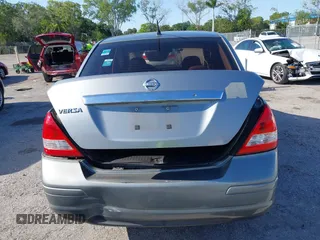 2009 Nissan Versa 1.8 S with VIN 3N1BC11E09L377706, listed as a IAAI auction lot 42027981 with 146,105 mi miles. Bid and sale history available at carsss.com. Image 16.