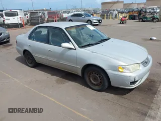 2002 Toyota Corolla CE with VIN 1NXBR12E92Z634444, listed as a IAAI auction lot 42819404 with 233,444 mi miles and . Bid and sale history available at DreamBid. Image 1.
