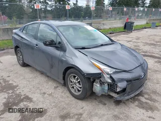 2016 Toyota Prius Two z VIN JTDKBRFUXG3000503, wystawiony jako IAAI lot #41954739 z przebiegiem 112 990 mil mil oraz . Historia ofert i sprzedaży dostępna na DreamBid. Obrazek 1.