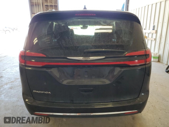 2022 Chrysler Pacifica Touring L with VIN 2C4RC1BG3NR195099, listed as a Copart auction lot 54214885 with 69,039 mi miles and Salvage title. Bid and sale history available at DreamBid. Image 6.