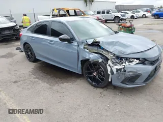 2022 Honda Civic Sport z VIN 2HGFE2F58NH569211, wystawiony jako IAAI lot #41784870 z przebiegiem 22 255 mil mil oraz . Historia ofert i sprzedaży dostępna na DreamBid. Obrazek 1.