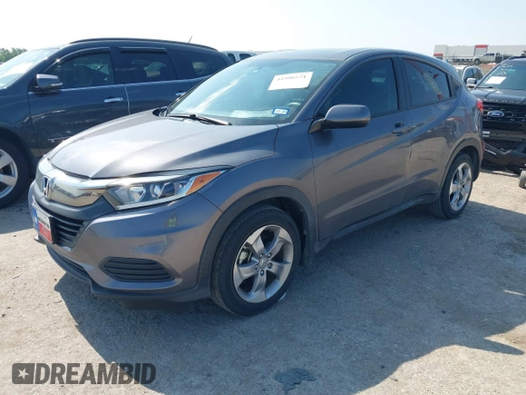 2022 Honda HR-V LX z VIN 3CZRU5H30NM718329, wystawiony jako IAAI lot #42396971 z przebiegiem 28 411 mil mil oraz . Historia ofert i sprzedaży dostępna na DreamBid. Obrazek 2.