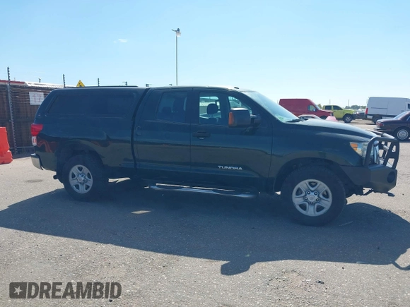 2010 Toyota Tundra z VIN 5TFUW5F11AX103188, wystawiony jako IAAI lot #39811998 z przebiegiem 198 948 mil mil oraz . Historia ofert i sprzedaży dostępna na DreamBid. Obrazek 13.