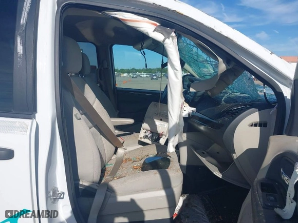 2019 Dodge Grand Caravan SE with VIN 2C7WDGBG7KR808178, listed as a IAAI auction lot 39601907 with 128,458 mi miles. Bid and sale history available at carsss.com. Image 5.