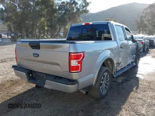 2020 Ford F-150 XL with VIN 1FTEW1C49LKD40054, listed as a IAAI auction lot 41837928 with 163,666 mi miles. Bid and sale history available at carsss.com. Image 4.