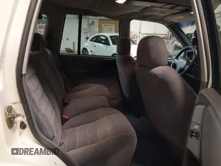 1997 Jeep Grand Cherokee Laredo z VIN 1J4GZ58S9VC562907, wystawiony jako IAAI lot #42102313 z przebiegiem 137 672 mil mil oraz . Historia ofert i sprzedaży dostępna na DreamBid. Obrazek 8.