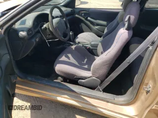2000 Pontiac Sunfire SE z VIN 1G2JB1249Y7165024, wystawiony jako Copart lot #71418264 z przebiegiem Nie podano mil oraz Szkody całkowita. Historia ofert i sprzedaży dostępna na DreamBid. Obrazek 7.