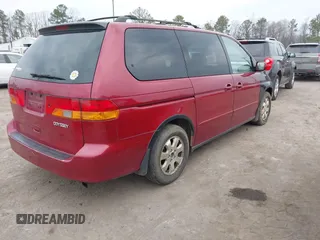 2004 Honda Odyssey EX-L with VIN 5FNRL18924B032981, listed as a IAAI auction lot 41656995 with 251,084 mi miles and . Bid and sale history available at DreamBid. Image 4.