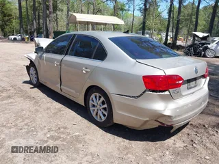 2013 Volkswagen Jetta SE with VIN 3VWDX7AJ9DM253430, listed as a IAAI auction lot 41997354 with 97,493 mi miles and . Bid and sale history available at DreamBid. Image 3.