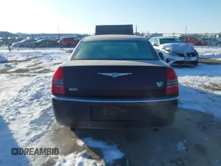 2005 Chrysler 300 with VIN 2C3AA63H65H526016, listed as a IAAI auction lot 41296420 with 136,794 mi miles. Bid and sale history available at carsss.com. Image 16.