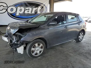 2009 Toyota Matrix z VIN 2T1KU40E29C173294, wystawiony jako Copart lot #60111645 z przebiegiem 104 511 mil mil oraz Szkoda całkowita • Salvage title. Historia ofert i sprzedaży dostępna na DreamBid. Obrazek 1.