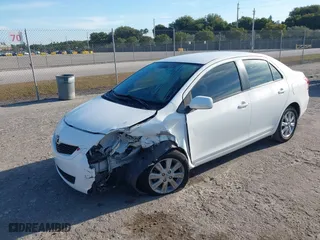 2009 Toyota Yaris with VIN JTDBT903791306893, listed as a IAAI auction lot 41901465 with 115,272 mi miles. Bid and sale history available at carsss.com. Image 17.