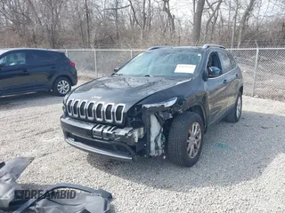 2015 Jeep Cherokee Latitude with VIN 1C4PJLCB3FW517843, listed as a IAAI auction lot 41828715 with 146,862 mi miles and . Bid and sale history available at DreamBid. Image 2.