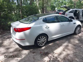 2015 Kia Optima EX with VIN 5XXGN4A75FG416779, listed as a IAAI auction lot 42642416 with 145,683 mi miles and . Bid and sale history available at DreamBid. Image 4.