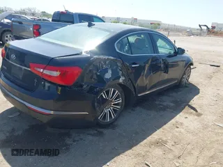 2014 Kia Cadenza Limited with VIN KNALN4D76E5140509, listed as a IAAI auction lot 42013923 with 168,680 mi miles. Bid and sale history available at carsss.com. Image 4.