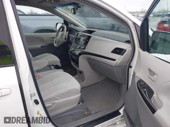 2012 Toyota Sienna LE AAS with VIN 5TDKK3DC3CS208853, listed as a IAAI auction lot 42205012 with 197,286 mi miles. Bid and sale history available at carsss.com. Image 5.