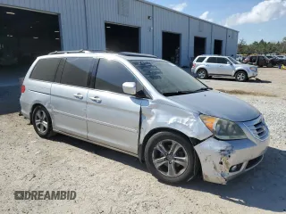 2010 Honda Odyssey Touring with VIN 5FNRL3H95AB067277, listed as a Copart auction lot 44845765 with 0 mi miles and Salvage Title. Bid and sale history available at carsss.com. Image 4.
