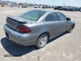 2004 Pontiac Grand Am SE1 with VIN 1G2NF52E84C250525, listed as a IAAI auction lot 42140148 with 156,971 mi miles. Bid and sale history available at carsss.com. Image 4.