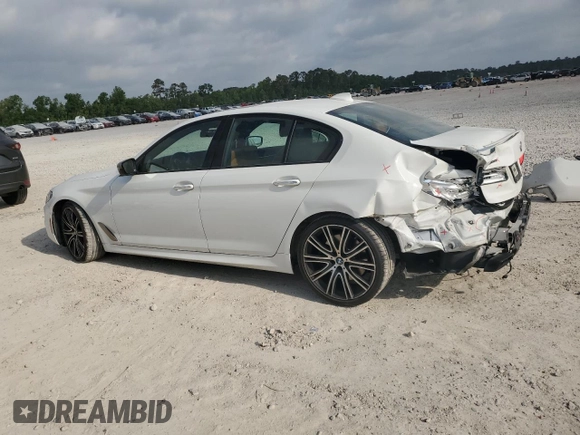 2018 BMW 5 Series M550i xDrive with VIN WBAJB9C58JG464461, listed as a Copart auction lot 53626575 with 62,436 mi miles and Salvage Title. Bid and sale history available at carsss.com. Image 2.