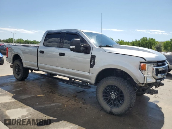2020 Ford F-250 XL with VIN 1FT7W2BN9LED33306, listed as a Copart auction lot 60313975 with 93,971 mi miles and Salvage title. Bid and sale history available at DreamBid. Image 4.
