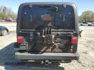 1997 Jeep Wrangler Sport with VIN 1J4FY19SXVP514573, listed as a Copart auction lot 52335135 with 89,479 mi miles and Clean Title. Bid and sale history available at carsss.com. Image 6.