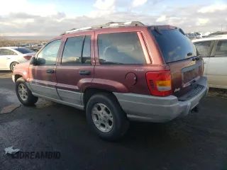 1999 Jeep Grand Cherokee Laredo with VIN 1J4GW58SXXC706962, listed as a Copart auction lot 88325515 with Not provided miles and Clean title. Bid and sale history available at DreamBid. Image 2.