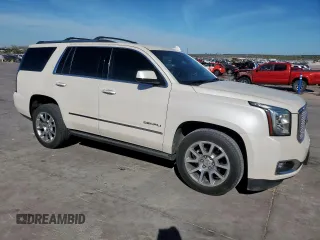 2015 GMC Yukon Denali z VIN 1GKS2CKJ6FR706151, wystawiony jako Copart lot #50556805 z przebiegiem 174 259 mil mil oraz Czysty tytuł • Clean title. Historia ofert i sprzedaży dostępna na DreamBid. Obrazek 4.