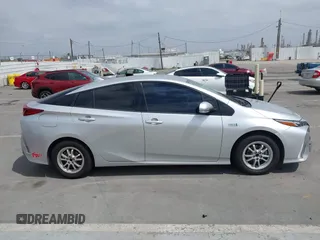 2017 Toyota Prius Plus z VIN JTDKARFPXH3053894, wystawiony jako IAAI lot #42208119 z przebiegiem 115 439 mil mil oraz . Historia ofert i sprzedaży dostępna na DreamBid. Obrazek 13.