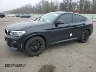 2020 BMW X4 xDrive30i z VIN 5UX2V1C08L9B97027, wystawiony jako Copart lot #50574175 z przebiegiem 124 221 mil mil oraz Szkoda całkowita • Salvage title. Historia ofert i sprzedaży dostępna na DreamBid. Obrazek 1.