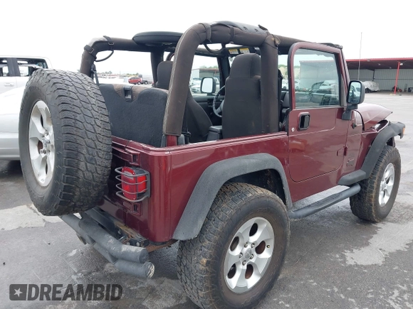 2003 Jeep Wrangler Sport with VIN 1J4FA49S63P324904, listed as a IAAI auction lot 42138001 with 170,917 mi miles and . Bid and sale history available at DreamBid. Image 4.