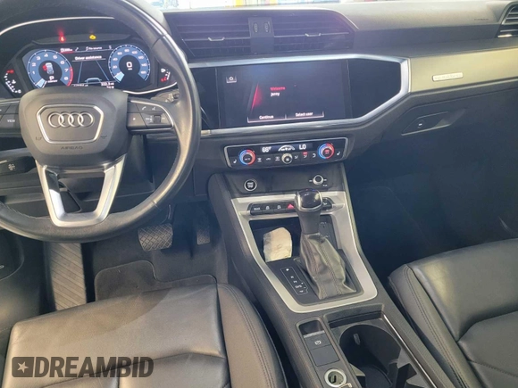 2023 Audi Q3 S line Premium with VIN WA1DECF37P1064251, listed as a IAAI auction lot 42791686 with 56,584 mi miles and . Bid and sale history available at DreamBid. Image 4.
