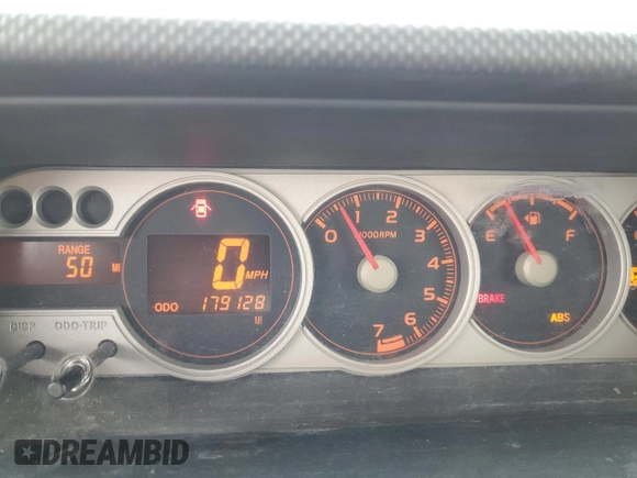 2008 Scion xB z VIN JTLKE50E281008694, wystawiony jako Copart lot #57127285 z przebiegiem 179 128 mil mil oraz Szkoda całkowita • Salvage title. Historia ofert i sprzedaży dostępna na DreamBid. Obrazek 9.