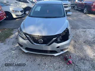2019 Nissan Sentra S with VIN 3N1AB7AP5KY332143, listed as a IAAI auction lot 42196842 with 51,386 mi miles and . Bid and sale history available at DreamBid. Image 6.