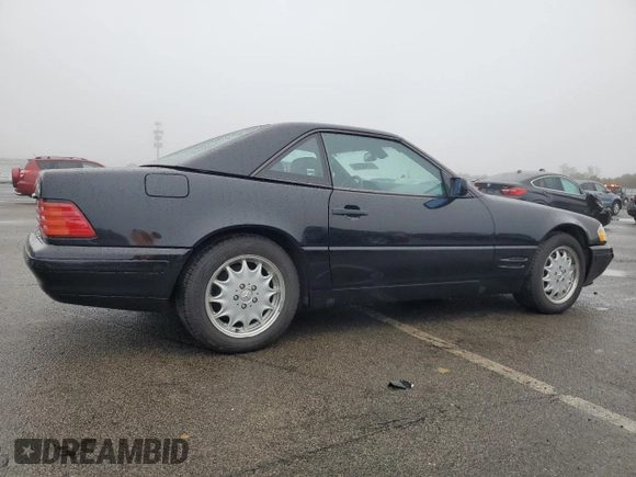 1998 Mercedes-Benz SL 500 with VIN WDBFA67F9WF159317, listed as a Copart auction lot 74148733 with 47,681 mi miles and Non repairable. Bid and sale history available at DreamBid. Image 3.