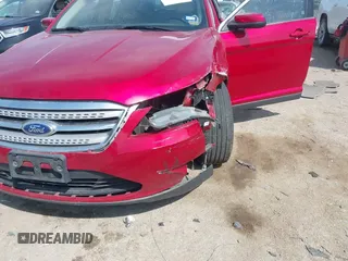 2011 Ford Taurus SEL z VIN 1FAHP2EW7BG123740, wystawiony jako IAAI lot #41890761 z przebiegiem 132 310 mil mil oraz . Historia ofert i sprzedaży dostępna na DreamBid. Obrazek 6.