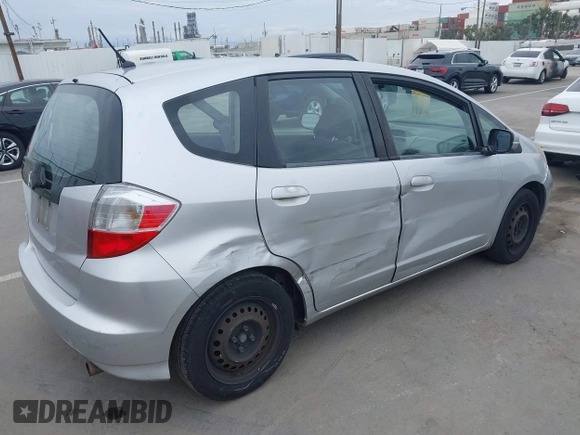 2013 Honda Fit with VIN JHMGE8H38DC002109, listed as a IAAI auction lot 42067257 with 305,739 mi miles. Bid and sale history available at carsss.com. Image 4.