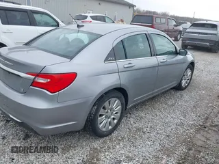 2013 Chrysler 200 LX with VIN 1C3CCBAB9DN641130, listed as a IAAI auction lot 41714609 with 175,465 mi miles. Bid and sale history available at carsss.com. Image 4.