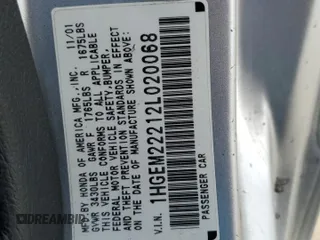 2002 Honda Civic DX with VIN 1HGEM22212L020068, listed as a Copart auction lot 50657135 with Not Provided miles and Salvage Title. Bid and sale history available at DreamBid. Image 14.