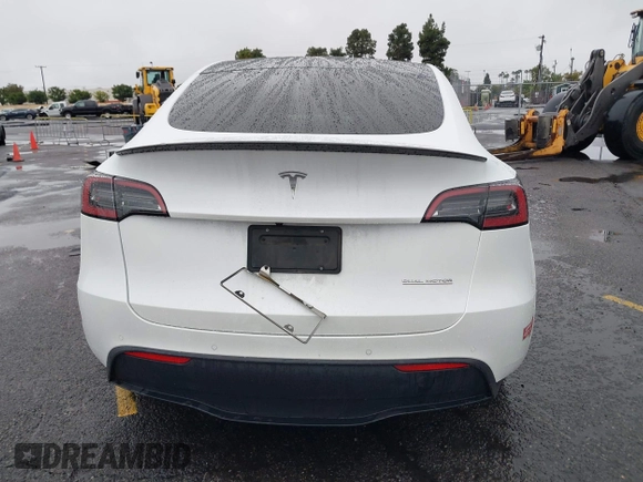 2022 Tesla Model Y Performance with VIN 7SAYGDEFXNF384268, listed as a IAAI auction lot 41558359 with 33,870 mi miles and . Bid and sale history available at DreamBid. Image 15.