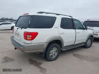 2004 Toyota Sequoia SR5 with VIN 5TDZT34A44S234566, listed as a IAAI auction lot 41594779 with 249,820 mi miles. Bid and sale history available at carsss.com. Image 4.