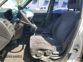 1999 Honda CR-V LX with VIN JHLRD2847XC019705, listed as a Copart auction lot 52220675 with 236,219 mi miles and Salvage Title. Bid and sale history available at carsss.com. Image 7.