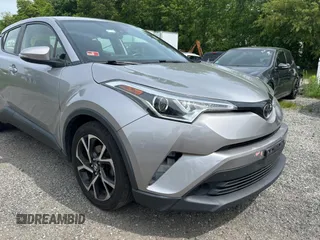2018 Toyota C-HR XLE z VIN JTNKHMBX1J1008358, wystawiony jako Copart lot #58927015 z przebiegiem 157 018 mil mil oraz Tytuł czysty. Historia ofert i sprzedaży dostępna na DreamBid. Obrazek 1.