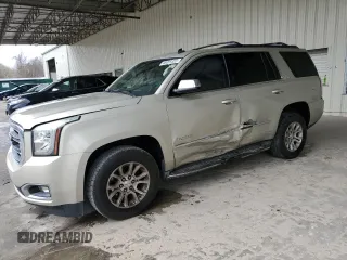 2015 GMC Yukon SLE with VIN 1GKS1AKC5FR120713, listed as a Copart auction lot 48009325 with 133,372 mi miles and Salvage Title. Bid and sale history available at carsss.com. Image 1.