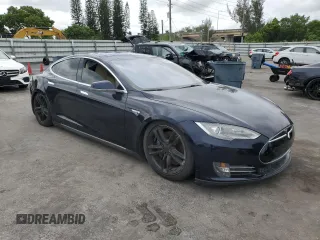 2014 Tesla Model S 60 with VIN 5YJSA1H16EFP51363, listed as a Copart auction lot 59960075 with 106,338 mi miles and Clean title. Bid and sale history available at DreamBid. Image 4.