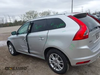 2015 Volvo XC60 T5 Drive-E Premier z VIN YV440MDB9F2613538, wystawiony jako IAAI lot #42183886 z przebiegiem 115 768 mil mil oraz . Historia ofert i sprzedaży dostępna na DreamBid. Obrazek 14.