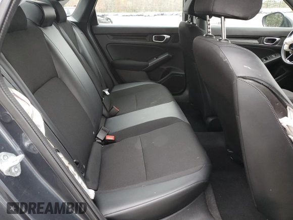 2023 Honda Civic Sport z VIN 2HGFE2F50PH556908, wystawiony jako Copart lot #52789655 z przebiegiem Nie podano mil oraz Szkoda całkowita • Salvage title. Historia ofert i sprzedaży dostępna na DreamBid. Obrazek 10.