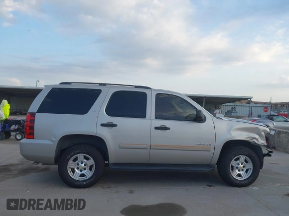 2008 Chevrolet Tahoe LS with VIN 1GNFC13C18R185820, listed as a IAAI auction lot 42662827 with 186,500 mi miles and . Bid and sale history available at DreamBid. Image 13.