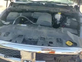 2023 Ram 1500 SLT with VIN 1C6RR7LG8PS517809, listed as a Copart auction lot 58149055 with 46,986 mi miles and Salvage title. Bid and sale history available at DreamBid. Image 14.