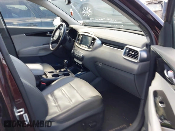 2016 Kia Sorento SX with VIN 5XYPKDA58GG002304, listed as a IAAI auction lot 41990332 with 132,025 mi miles. Bid and sale history available at carsss.com. Image 5.