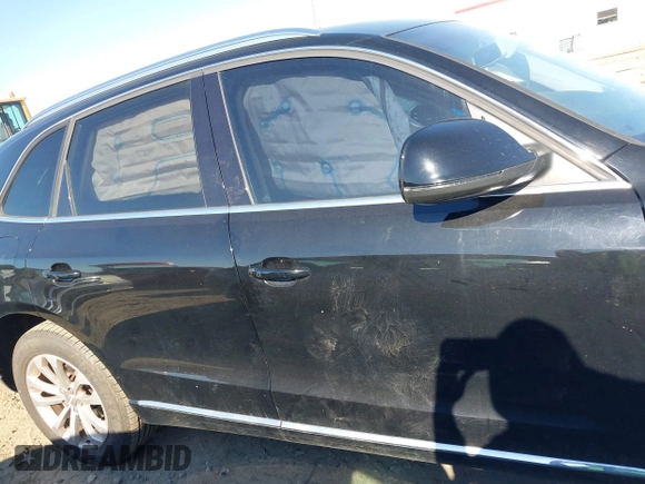 2014 Audi Q5 Premium with VIN WA1CFAFP4EA017515, listed as a IAAI auction lot 41000205 with 194,104 mi miles and . Bid and sale history available at DreamBid. Image 14.